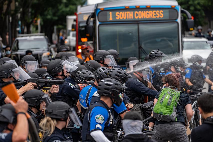Police fire tear gas and rubber bullets at several demonstrators in Austin on May 31, 2020.